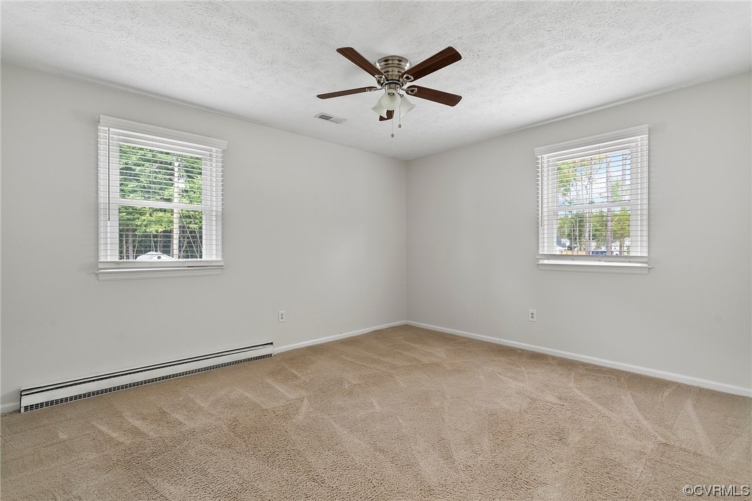 15418 Saddlebrook Road Chesterfield, VA 23838 - Photo 17 of 32 a view of an empty room with a window
