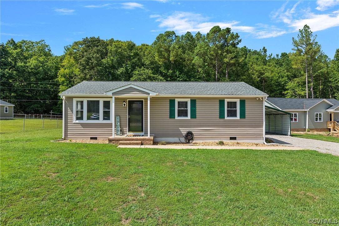 15418 Saddlebrook Road Chesterfield, VA 23838 - Photo 24 of 32 a front view of a house with a garden and trees
