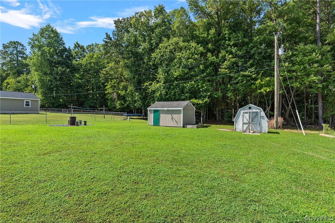 15418 Saddlebrook Road Chesterfield, VA 23838 - Photo 27 of 32 a front view of a house with a yard and trees