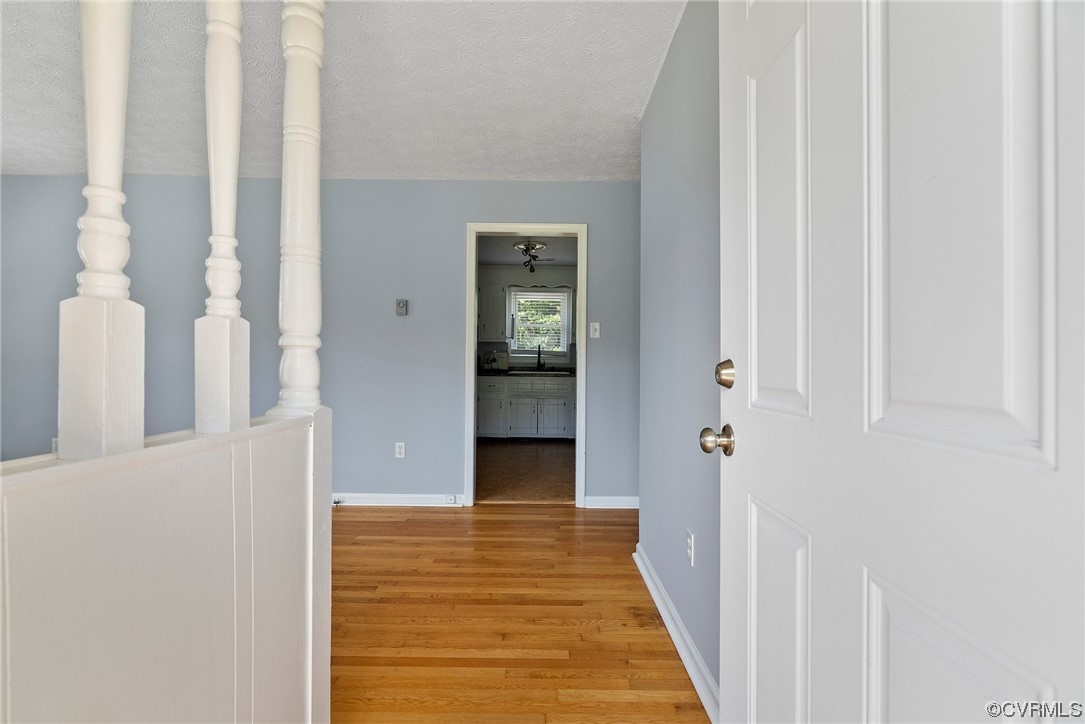 15418 Saddlebrook Road Chesterfield, VA 23838 - Photo 3 of 32 a view of a hallway with wooden floor and entryway