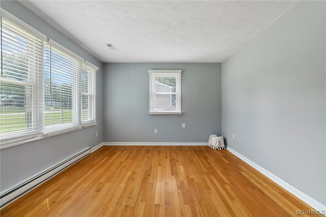 15418 Saddlebrook Road Chesterfield, VA 23838 - Photo 5 of 32 a view of a room with wooden floor and window