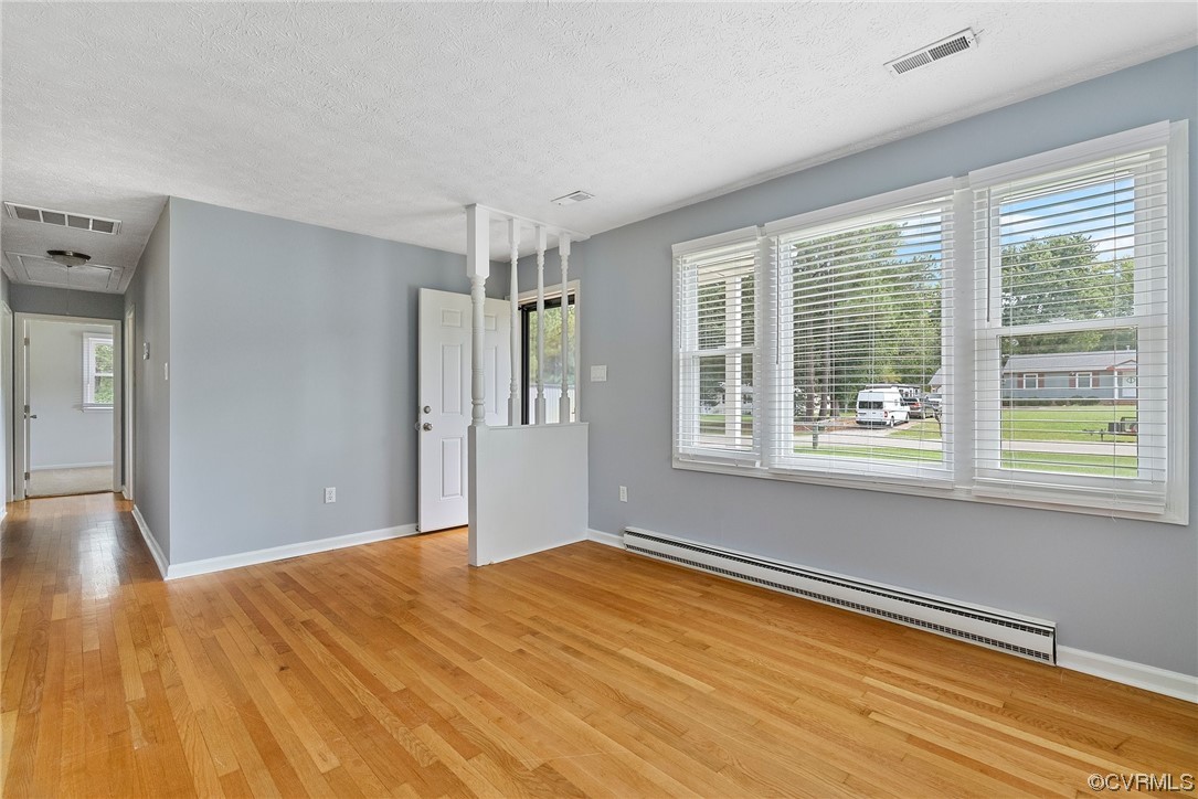 15418 Saddlebrook Road Chesterfield, VA 23838 - Photo 6 of 32 a view of empty room with wooden floor and fan