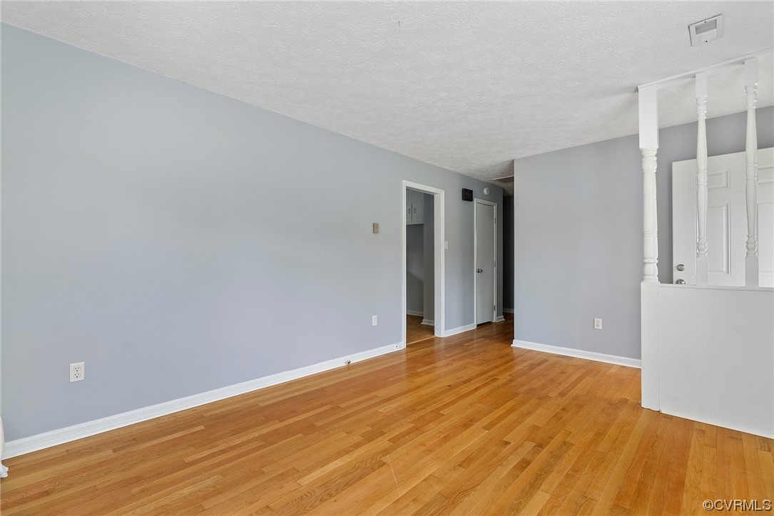 15418 Saddlebrook Road Chesterfield, VA 23838 - Photo 7 of 32 a view of an empty room with wooden floor