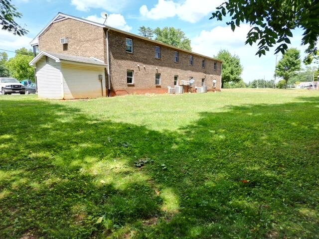 154 Wrays Chapel Road Rocky Mount, VA 24151 - Photo 2 of 4 a view of a house with backyard
