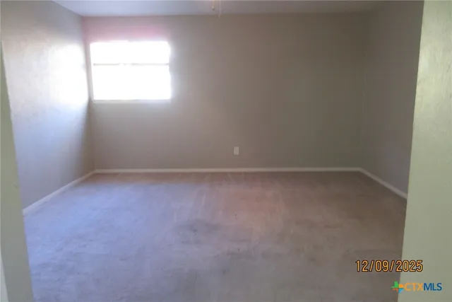 an empty room with a window