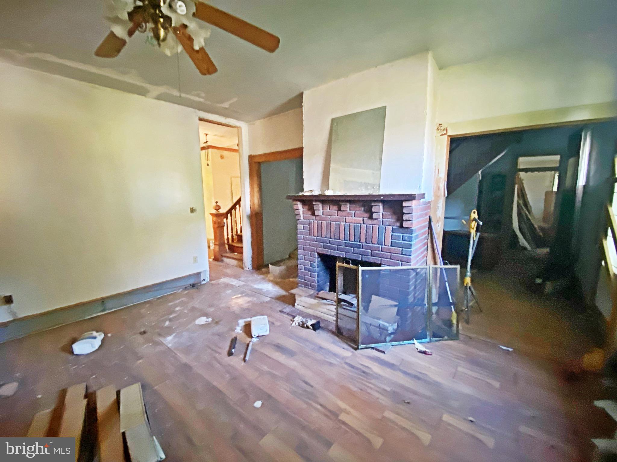 401 North Main Street Hurlock, MD 21643 - Photo 11 of 29 Family Room with Brick Fireplace