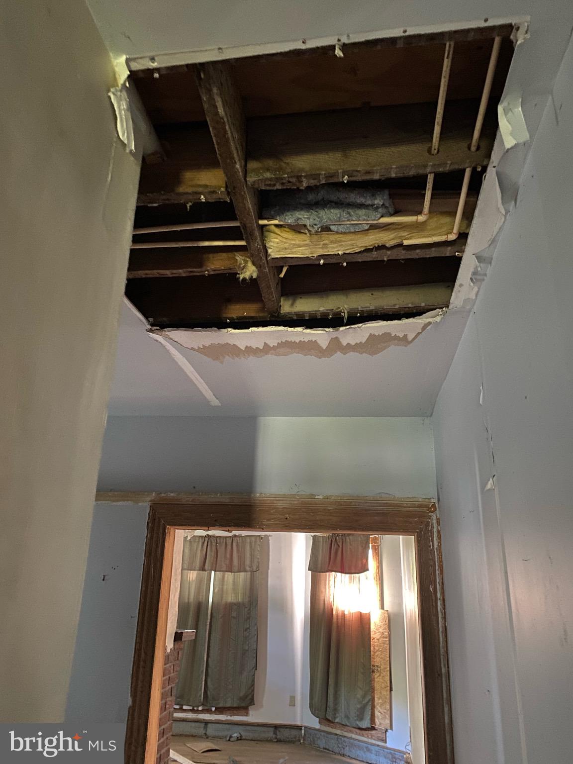 401 North Main Street Hurlock, MD 21643 - Photo 29 of 29 Hole cut out of ceiling