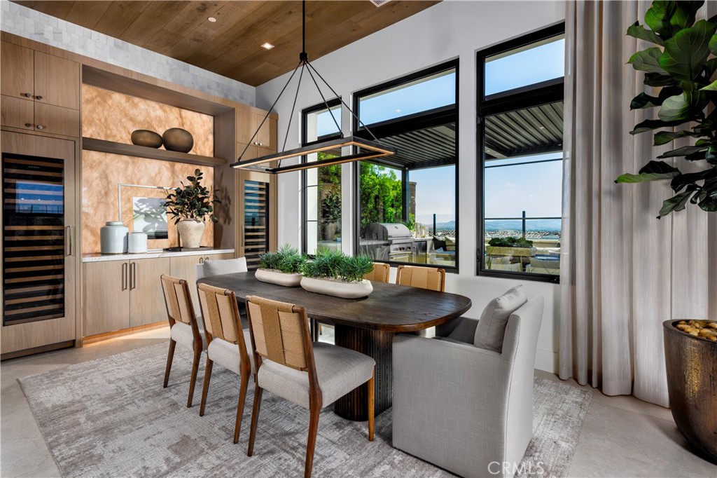 552 Peninsula Irvine, CA 92602 - Photo 12 of 19 a dining room with furniture and window
