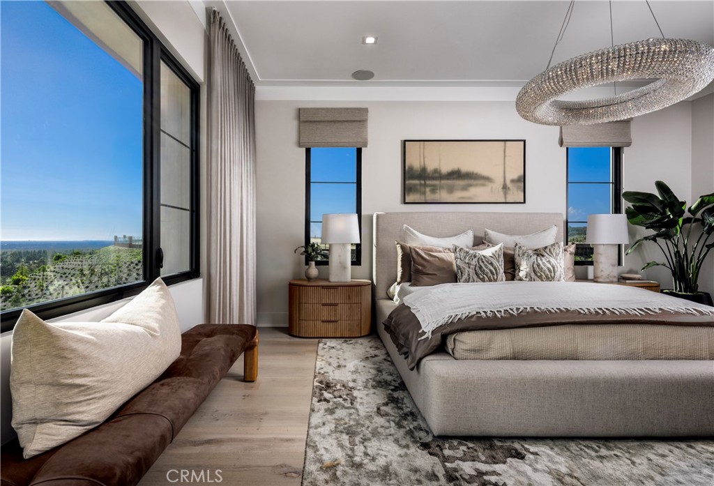 552 Peninsula Irvine, CA 92602 - Photo 14 of 19 a living room with furniture and a floor to ceiling window