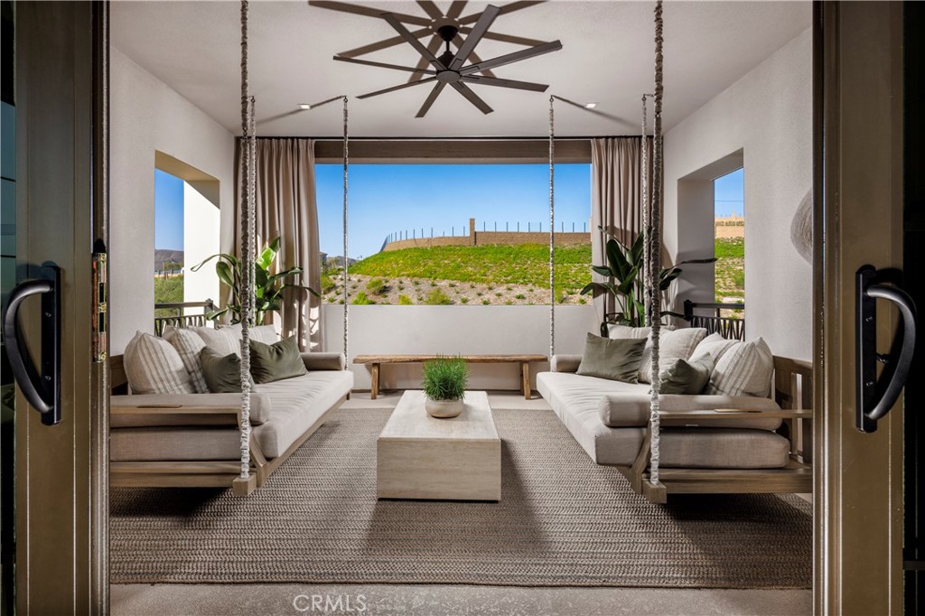 552 Peninsula Irvine, CA 92602 - Photo 17 of 19 a living room with furniture and a large window