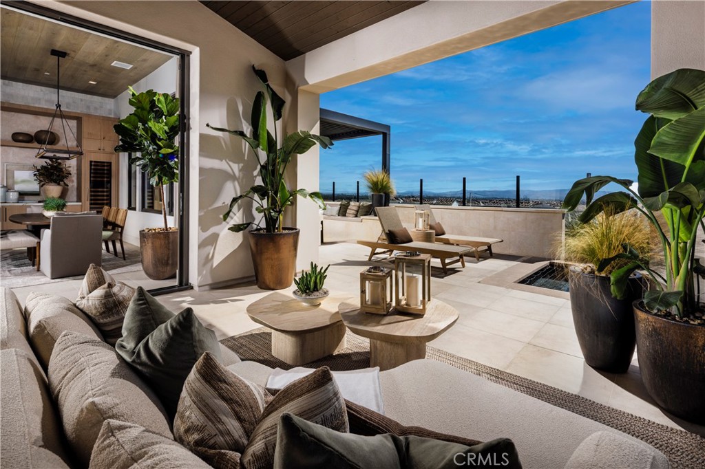 552 Peninsula Irvine, CA 92602 - Photo 5 of 19 a view of a dining room with furniture and wooden floor