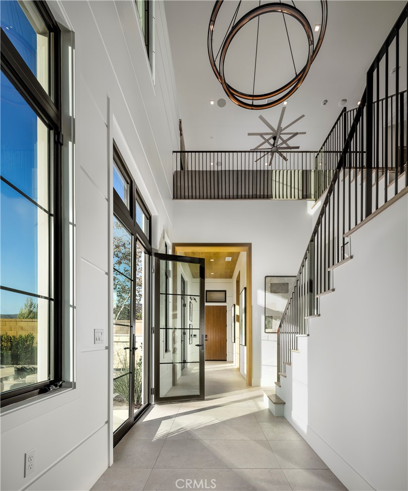 552 Peninsula Irvine, CA 92602 - Photo 7 of 19 a view of an entryway with wooden floor