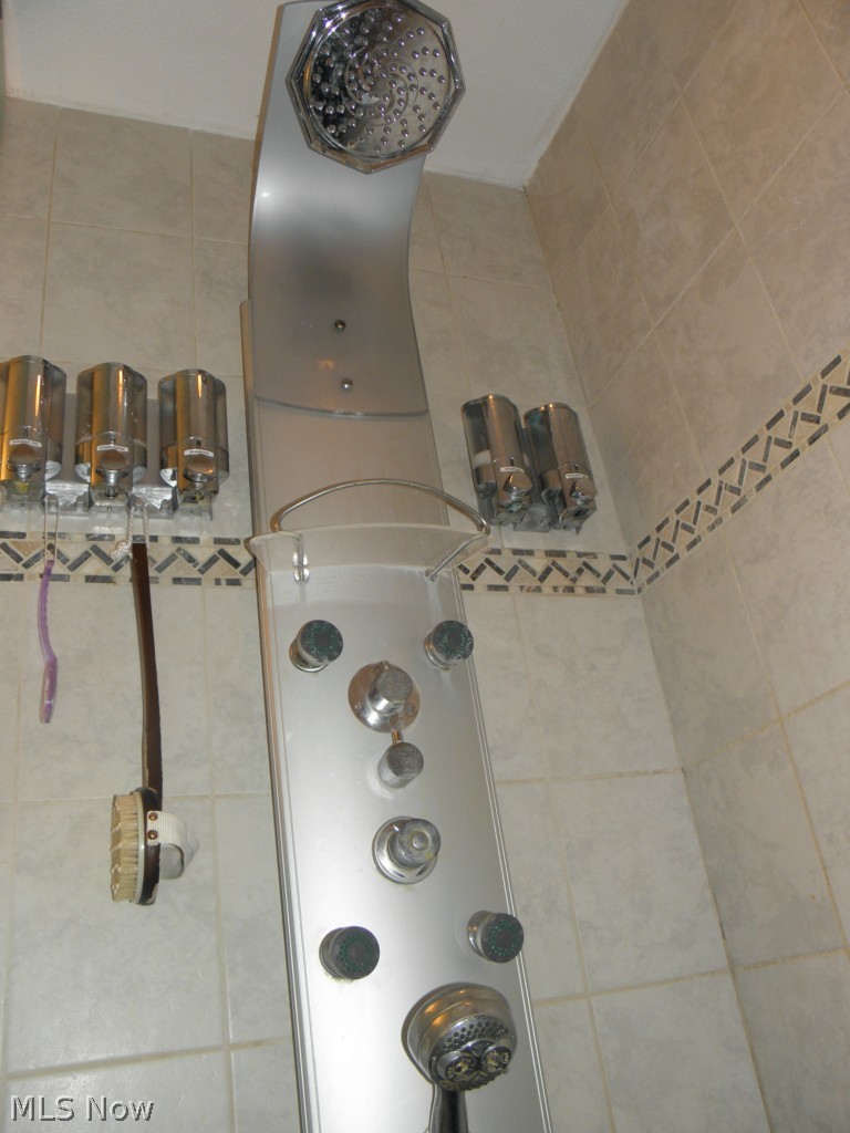 2578 Martin Road Mogadore, OH 44260 - Photo 14 of 25 Master bathroom shower surrounded tile. Easy care maintenance at it prettiest.