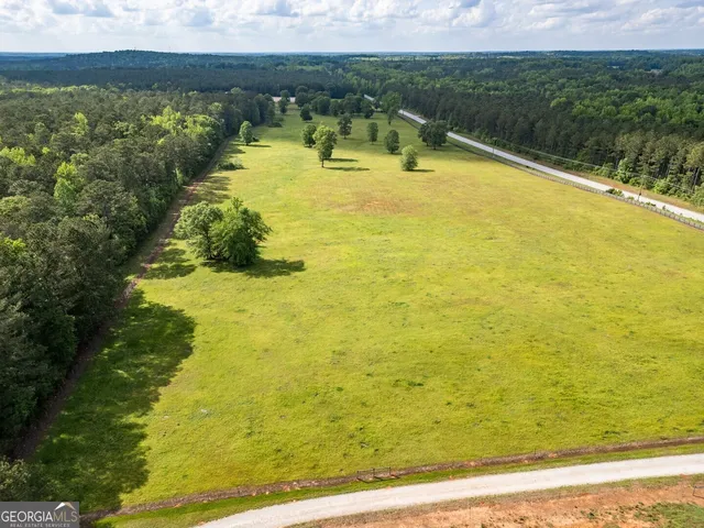 a view of a lake with a big yard