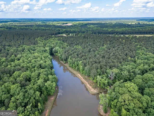a view of a lake with a outdoor space