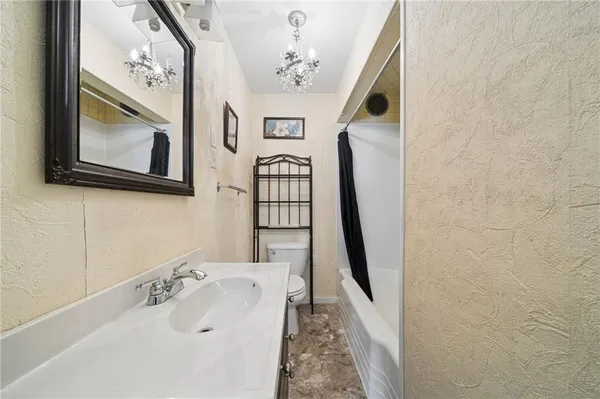 a view of livingroom with furniture and windows