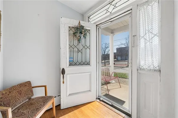 a view of an entryway with livingroom