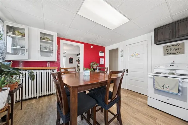 a kitchen with a sink a window and appliances