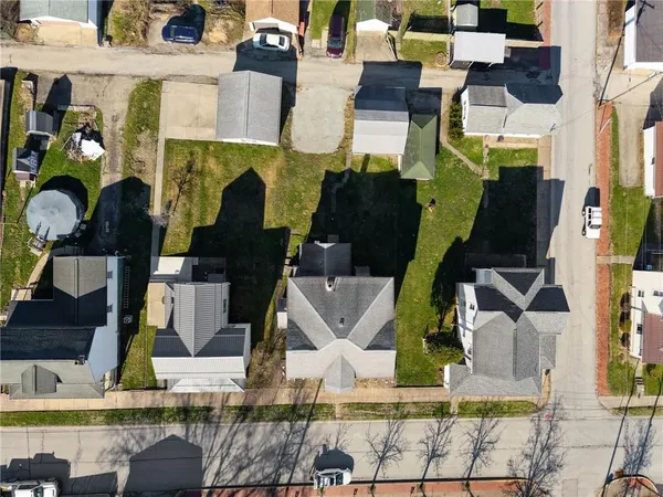 an aerial view of a city with lots of residential buildings