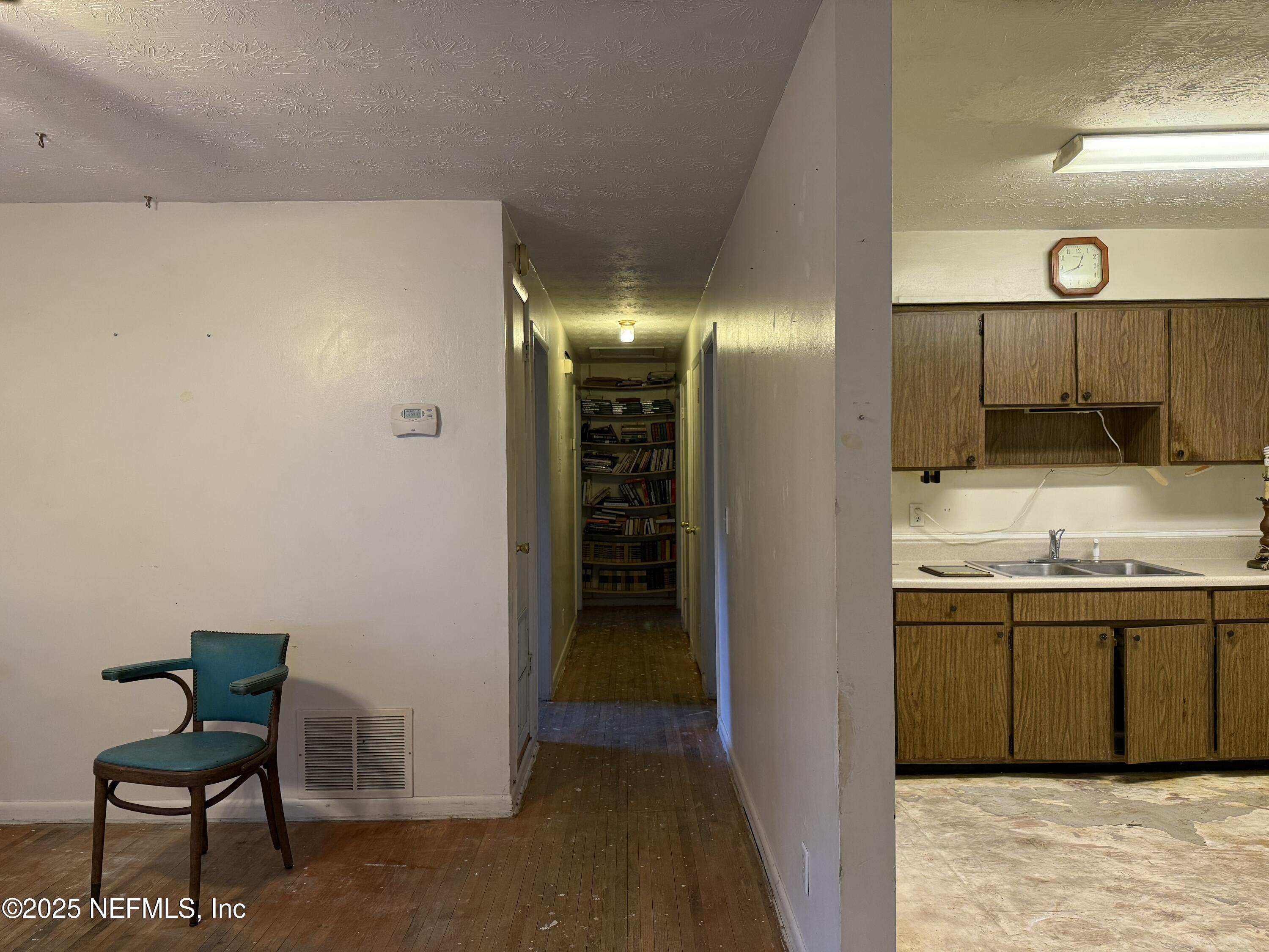 679 James Court Macclenny, FL 32063 - Photo 11 of 17 a bathroom with a sink and a mirror
