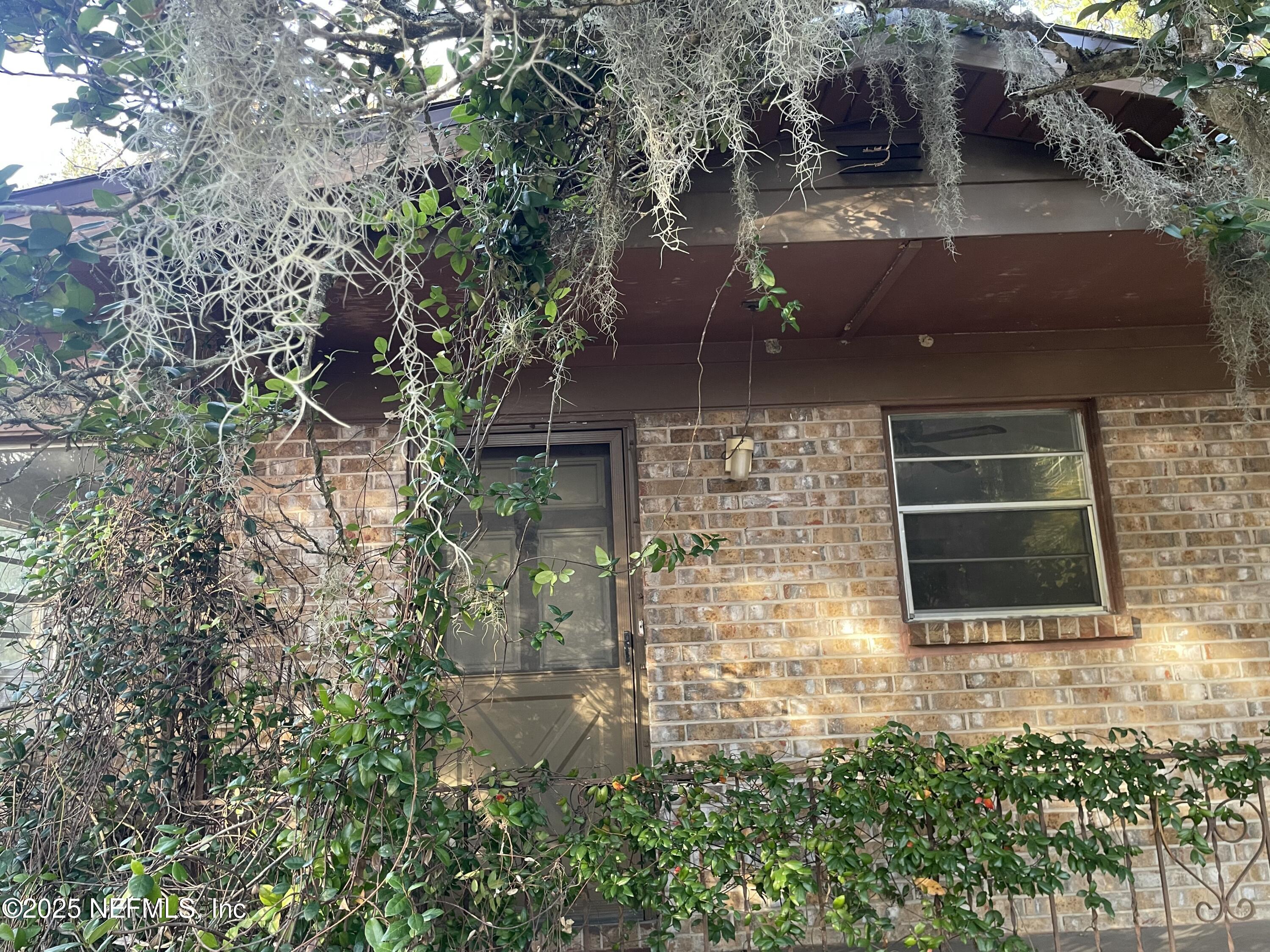 679 James Court Macclenny, FL 32063 - Photo 5 of 17 a backyard of a house with lots of green space