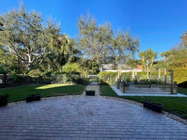 116 Via Rosina Jupiter, FL 33458 - Photo 27 of 33 a green field with lots of trees in the background