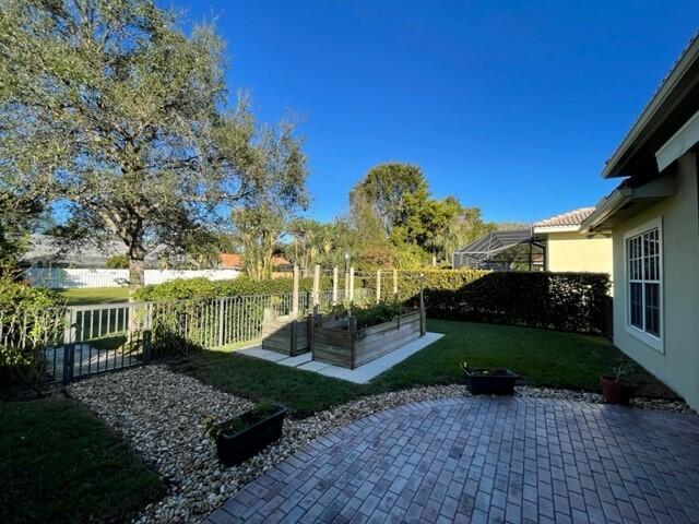 116 Via Rosina Jupiter, FL 33458 - Photo 28 of 33 a view of a park with plants and large trees