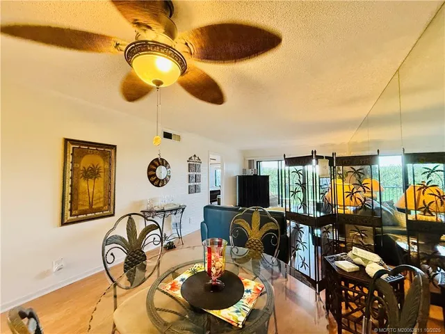 a view of a livingroom with furniture and entryway