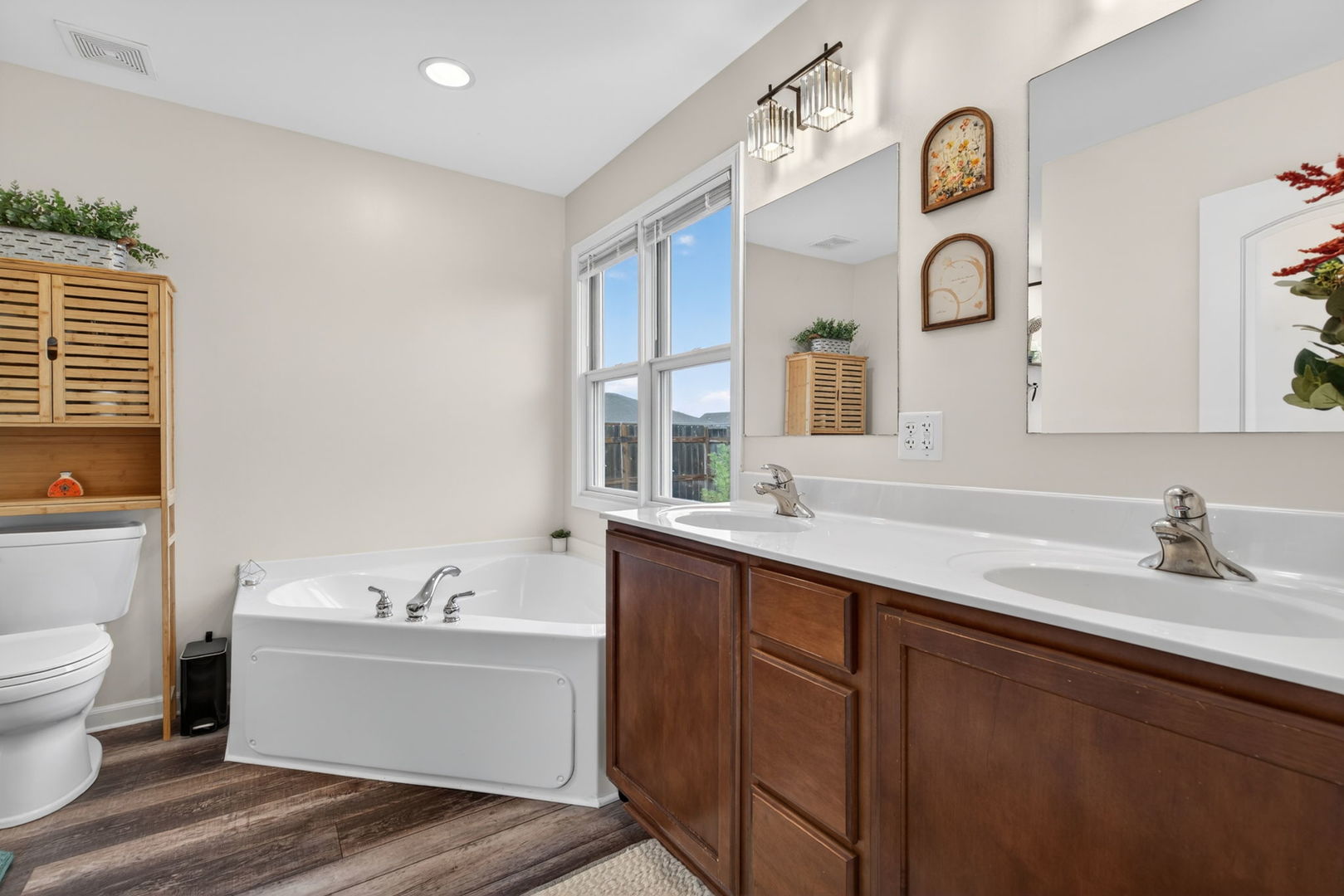 2031 Locust Road Morris, IL 60450 - Photo 18 of 32 a bathroom with a double vanity sink mirror and toilet