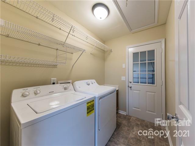 1347 Mistletoe Ridge Place Northwest Concord, NC 28027 - Photo 16 of 34 a utility room with dryer and washer