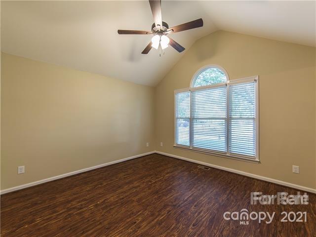 1347 Mistletoe Ridge Place Northwest Concord, NC 28027 - Photo 21 of 34 wooden floor in an empty room with a window