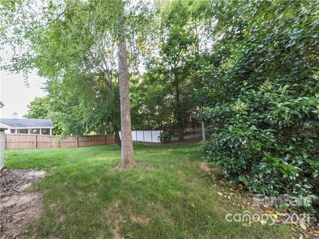 1347 Mistletoe Ridge Place Northwest Concord, NC 28027 - Photo 34 of 34 a view of a backyard with large trees