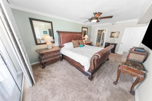 a bathroom with a sink a toilet a mirror and shower