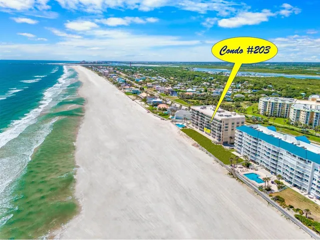 a view of a chairs and table on the wooden floor