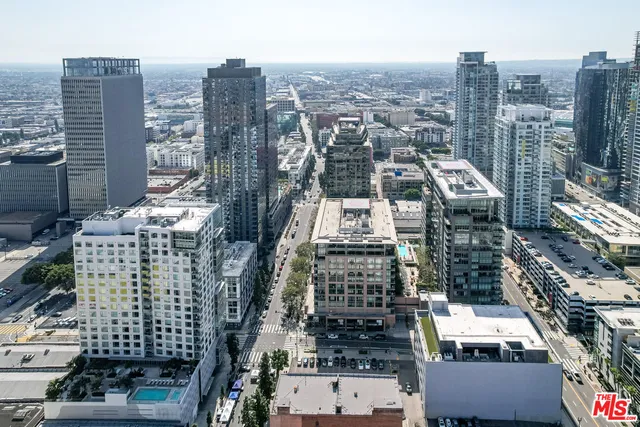 a view of city with tall buildings
