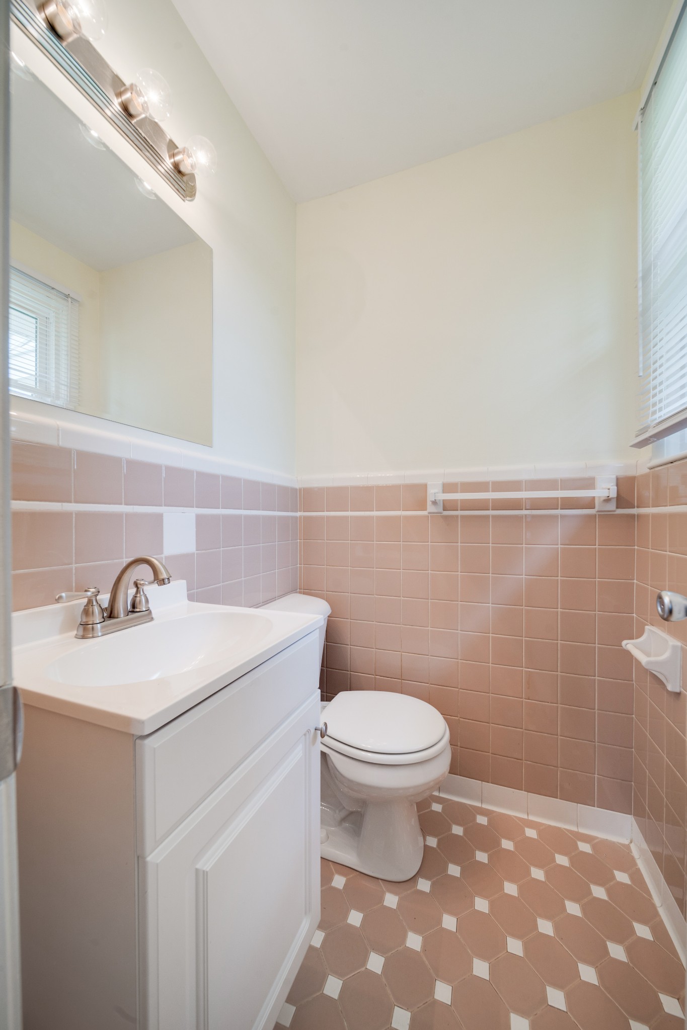 411 Walton Ferry Road Hendersonville, TN 37075 - Photo 17 of 26 a bathroom with a sink a toilet and a mirror