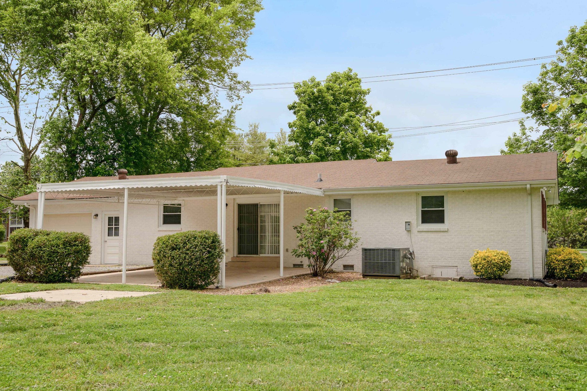 411 Walton Ferry Road Hendersonville, TN 37075 - Photo 25 of 26 front view of house with a yard