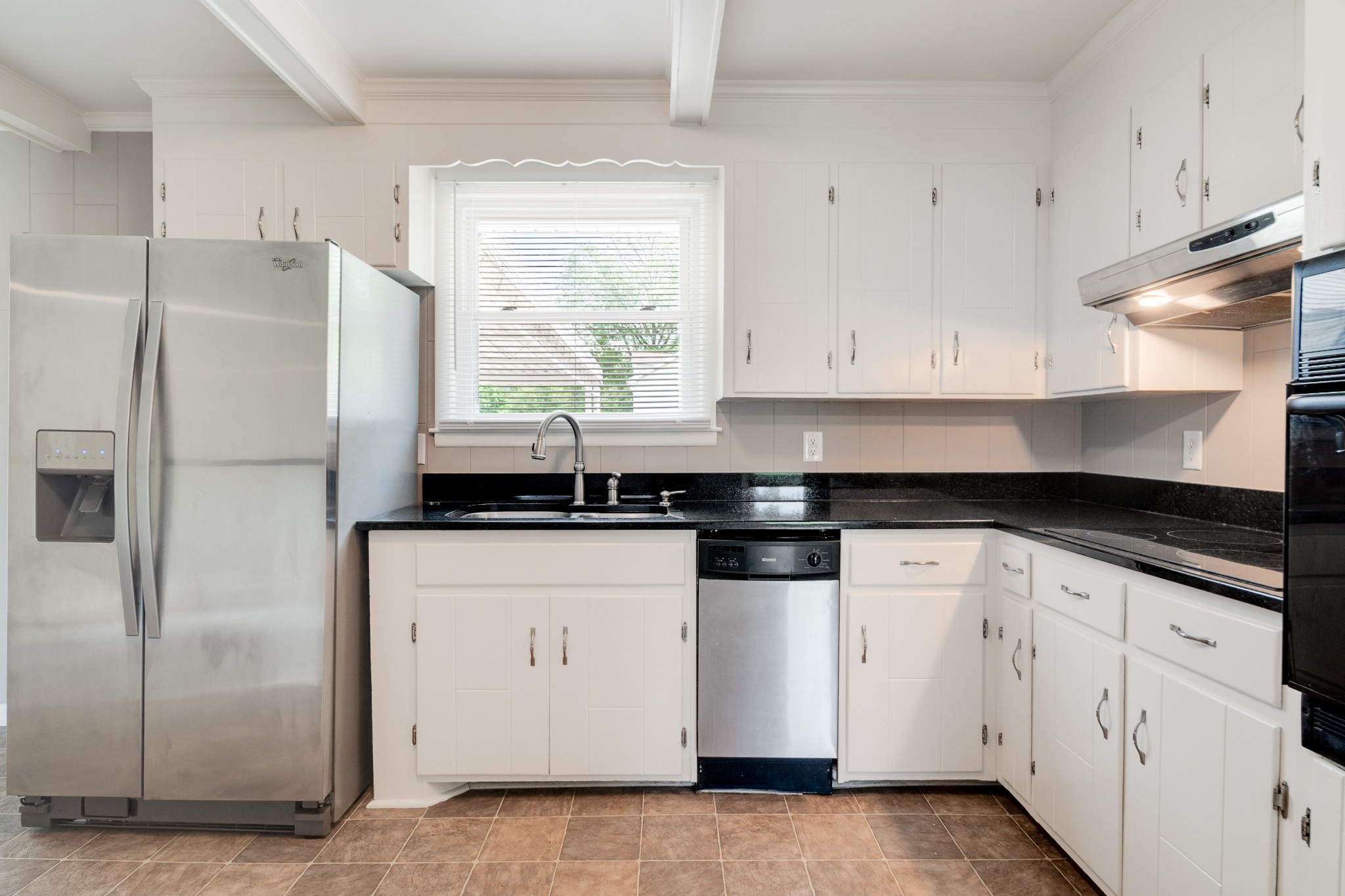411 Walton Ferry Road Hendersonville, TN 37075 - Photo 7 of 26 a kitchen with granite countertop white cabinets and refrigerator