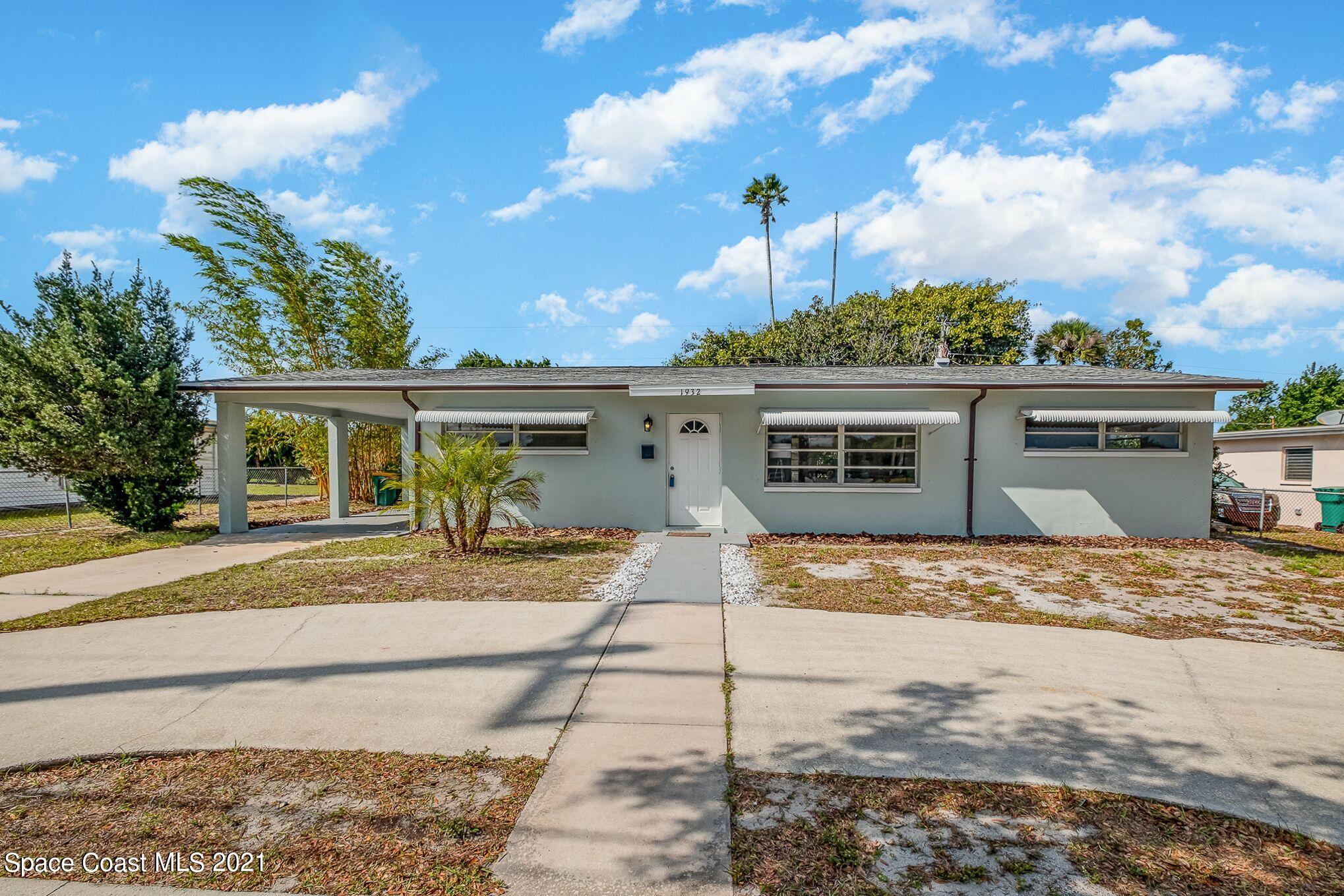 1932 Sarno Road Melbourne, FL 32935 - Photo 1 of 24 Front