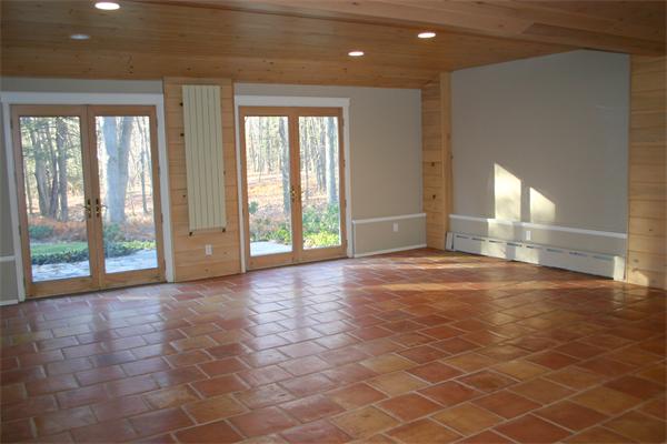 92 Slough Road Harvard, MA 01451 - Photo 21 of 30 a view of an empty room with wooden floor and a window