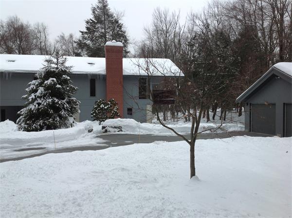 92 Slough Road Harvard, MA 01451 - Photo 5 of 30 a view of a house with a yard covered in snow