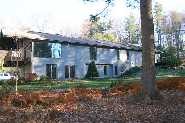 92 Slough Road Harvard, MA 01451 - Photo 8 of 30 a view of a house with backyard and a tree