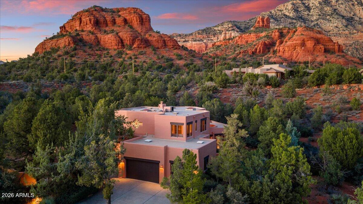 30 West Gunsmoke Road Sedona, AZ 86336 - Photo 1 of 73 an aerial view of a house with a yard