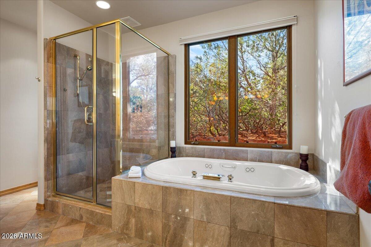 30 West Gunsmoke Road Sedona, AZ 86336 - Photo 26 of 73 a bathroom with shower and a bathtub