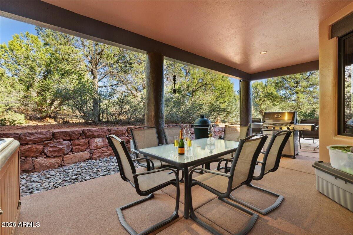 30 West Gunsmoke Road Sedona, AZ 86336 - Photo 52 of 73 a view of a dining room with furniture window and outside view