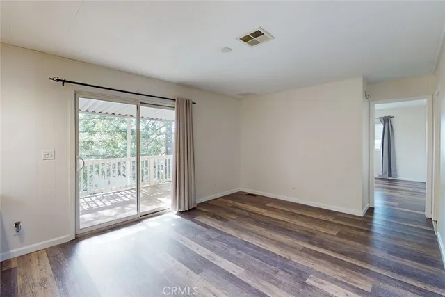 a bathroom with a tub sink and a mirror