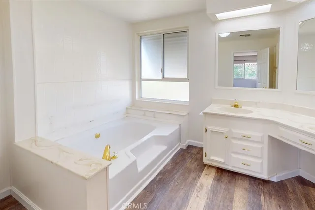 a utility room with closet dryer and washer