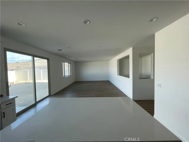 a view of an empty room and window