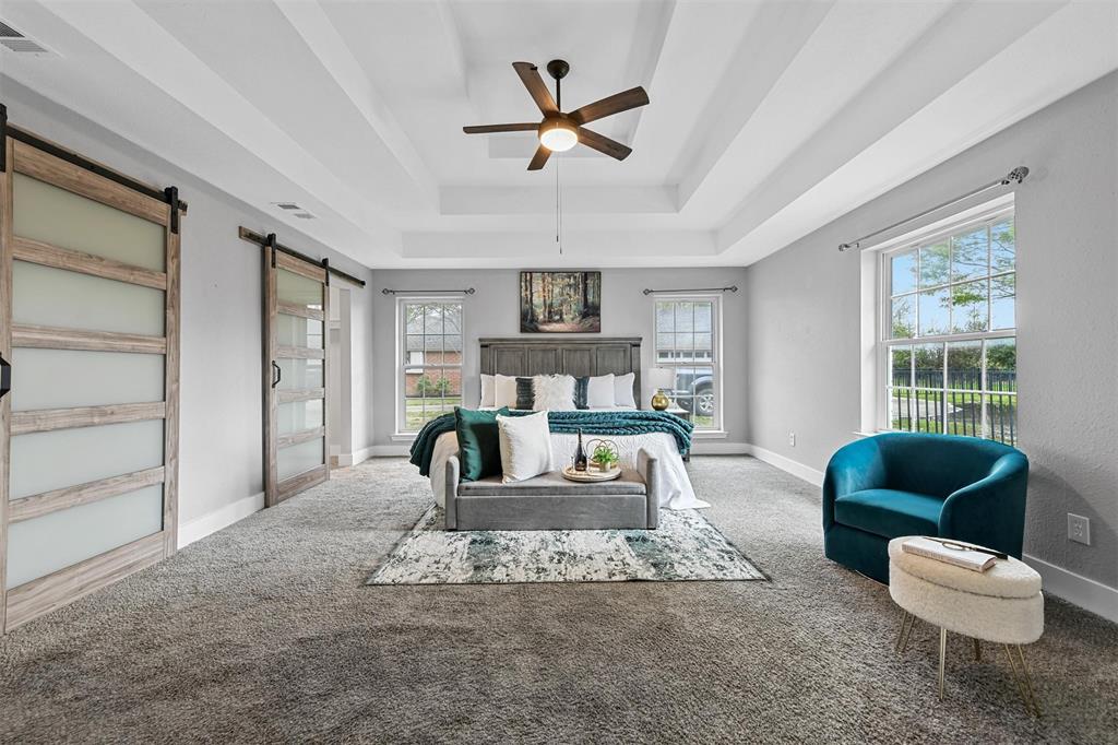 303 Riva Ridge Wylie, TX 75098 - Photo 18 of 38 a living room with furniture and a large window