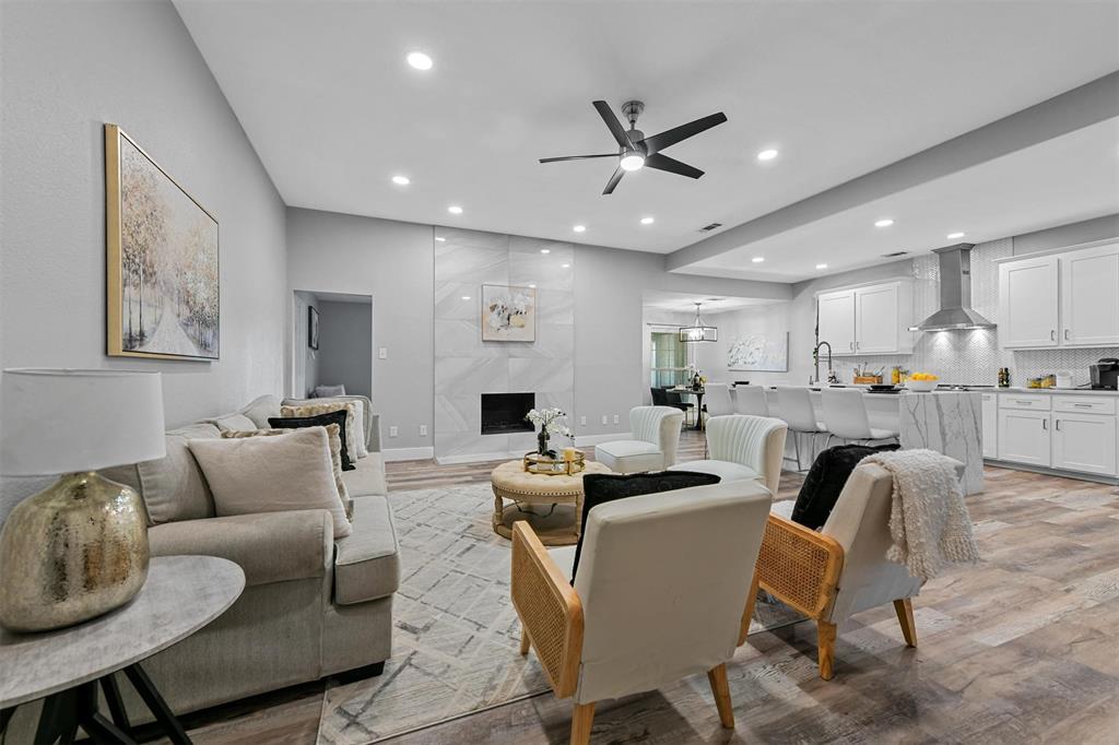 303 Riva Ridge Wylie, TX 75098 - Photo 7 of 38 a living room with furniture and kitchen view
